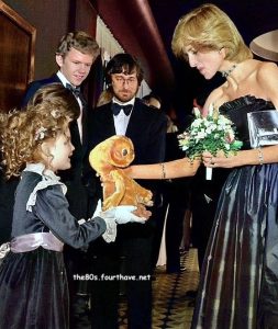 Drew Barrymore giving Princess Diana her E.T. gift (1982)