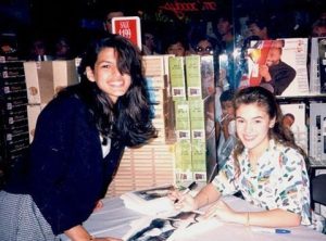 Eva Mendez getting an autograph from Alyssa Milano, 1989