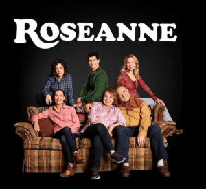 John Goodman, Roseanne Barr, Sara Gilbert, Michael Fishman, Alicia Goranson, and Laurie Metcalf in Roseanne (1988)