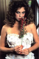 Traci-Lords-with-flowers