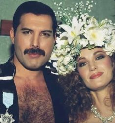 5 November 1985 - Freddie Mercury in a show-stealing moment with the lovely Jane Seymour during Fashion Aid